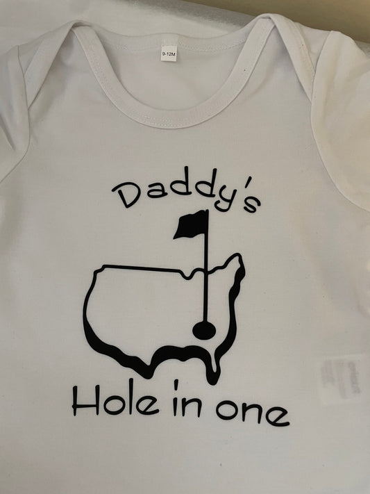 Daddy’s hole in one!